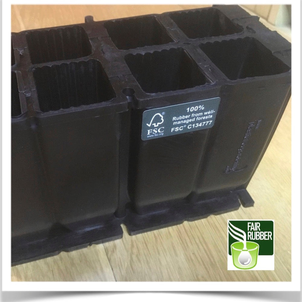 Side view of the RootCoachTM Natural Rubber Seed Tray in twin packs of four cells each.